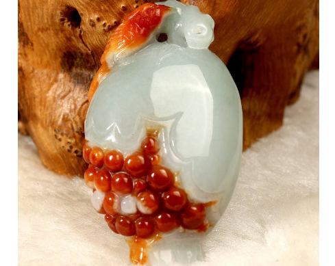 翡翠捏石榴和佛教手的寓意是什么