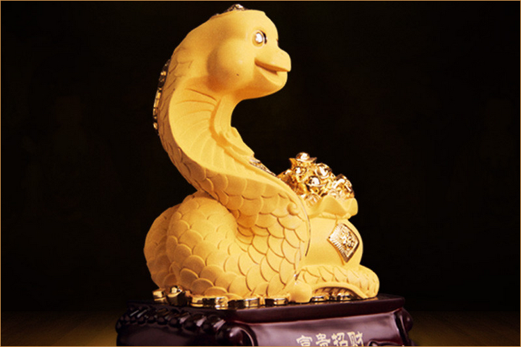 黄金蛇盘元宝的寓意是什么